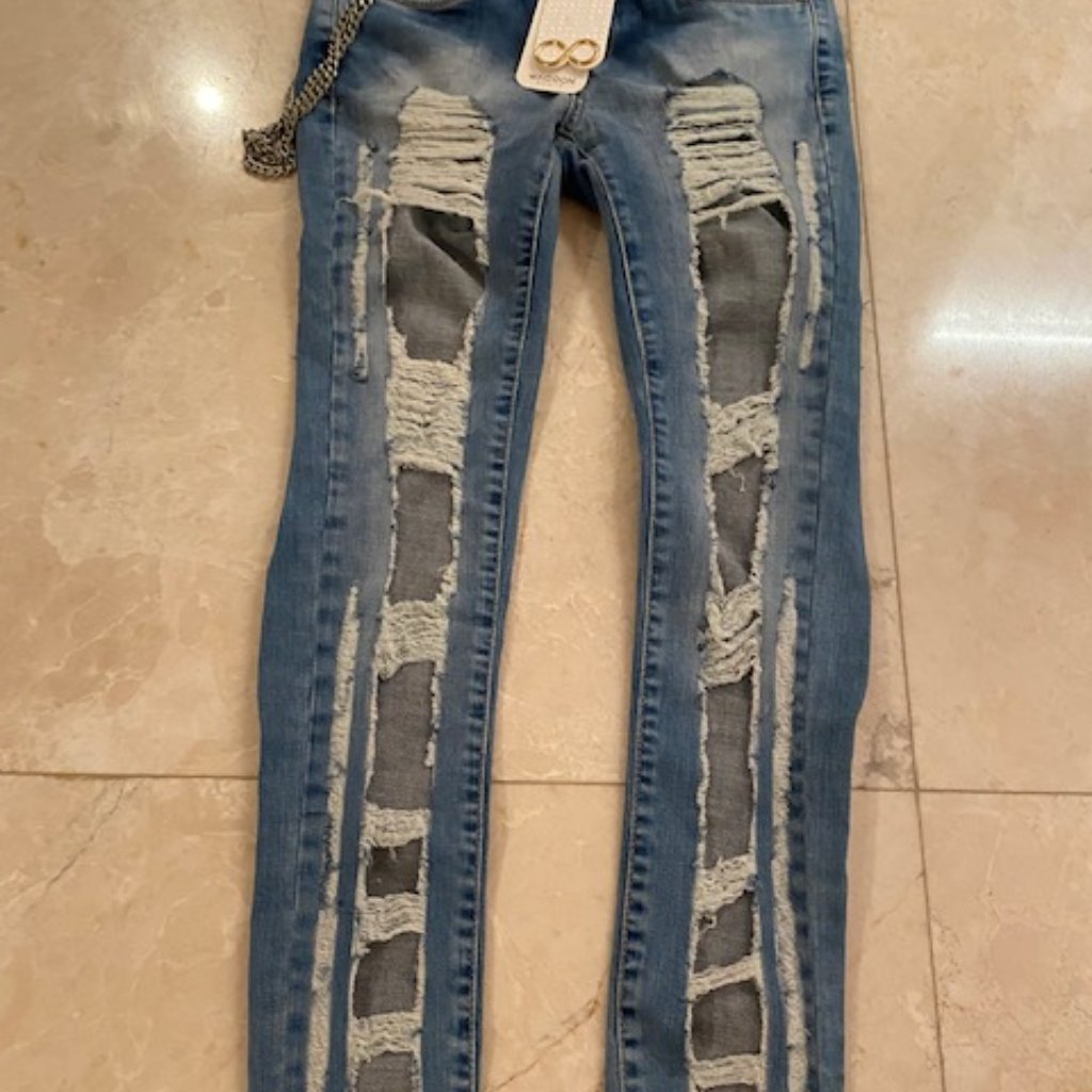 Brand New Paris Ripped Jeans
